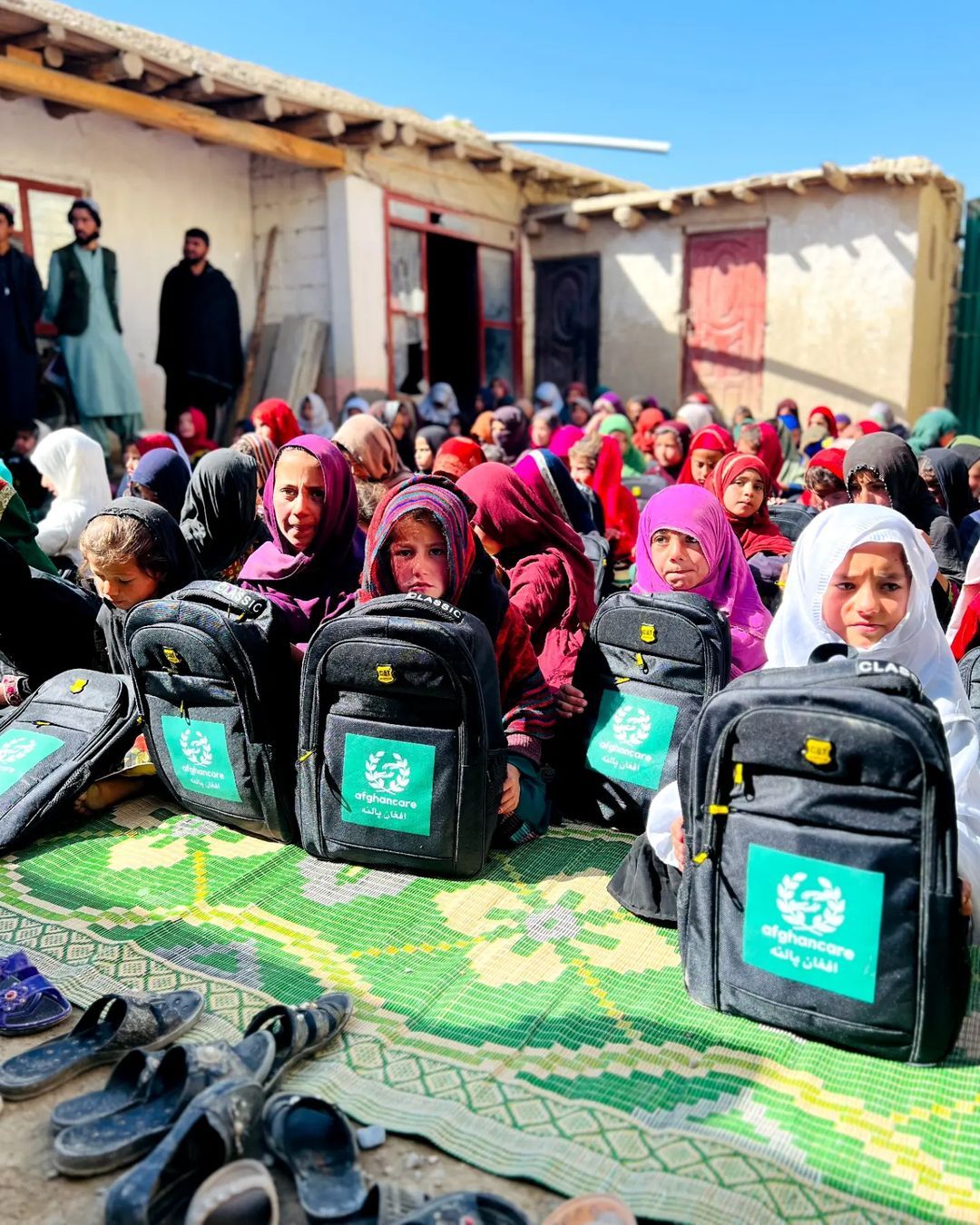 200 Afghan girls with school supplies and bags provided by AfghanCare